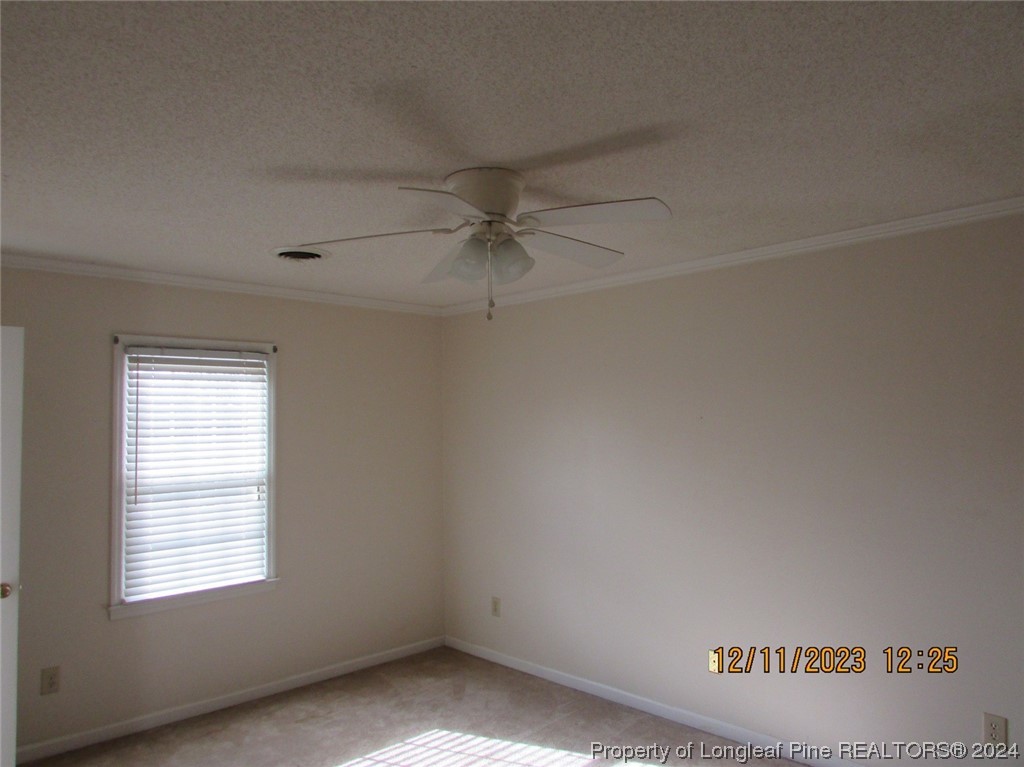 8850 Timothy Road Dunn, NC 28334 - Photo 10 of 15 an empty room with a window