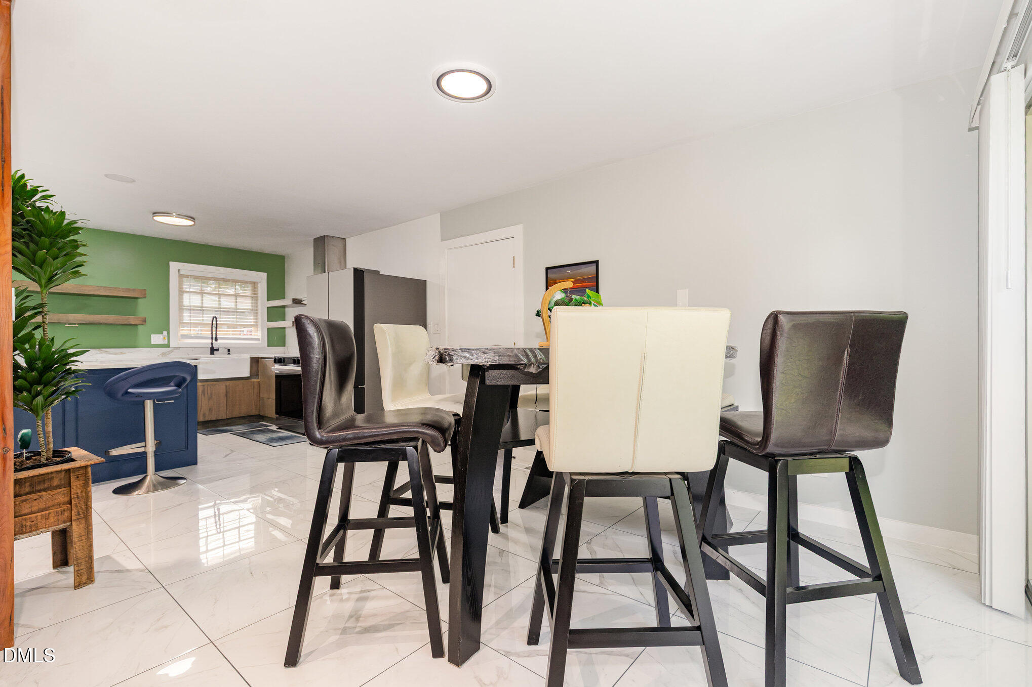 5333 Olive Road Raleigh, NC 27606 - Photo 9 of 21 a view of kitchen with furniture and a refrigerator