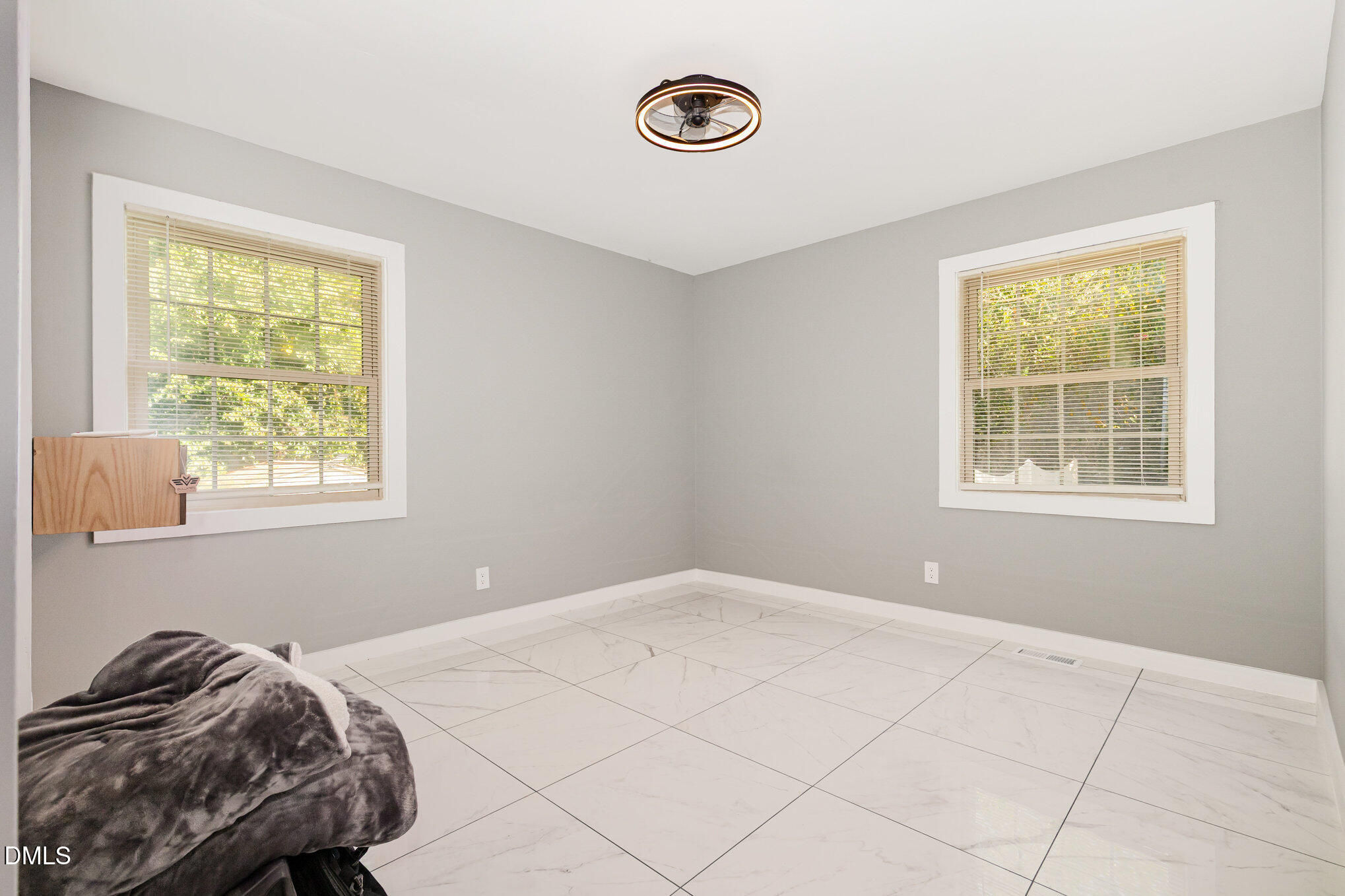5333 Olive Road Raleigh, NC 27606 - Photo 15 of 21 a bedroom with a bed and a window