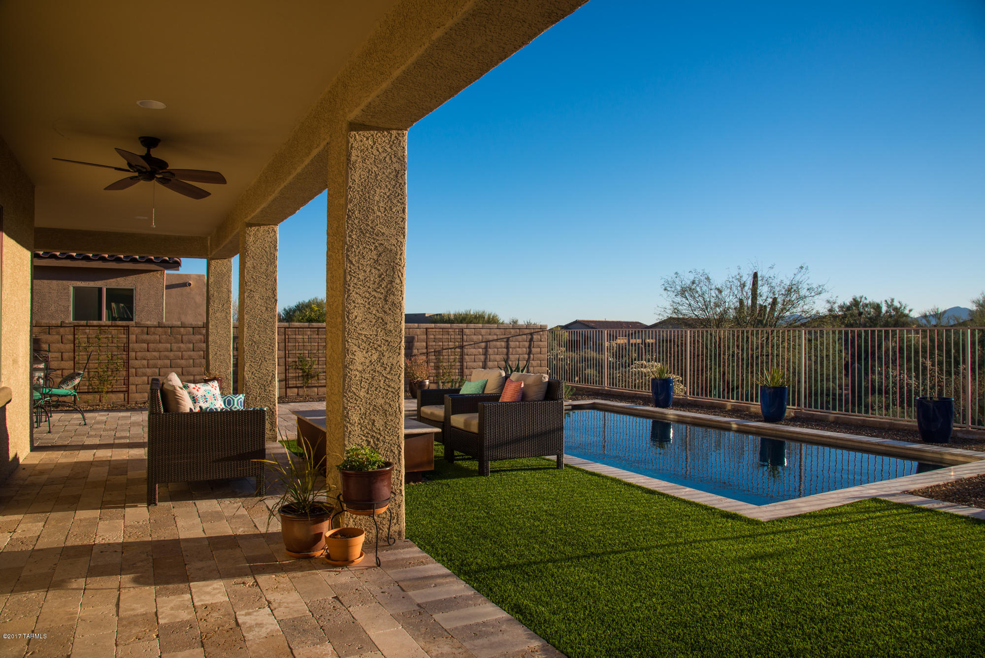 4405 West Crystal Ranch Place Marana, AZ 85658 - Photo 12 of 44 a view of a terrace with couches and sky view