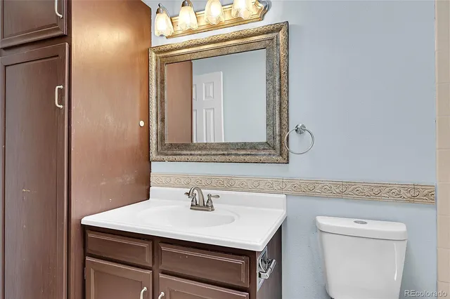 a bathroom with a sink and a toilet