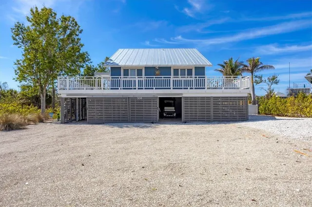 a view of house with outdoor space and yard