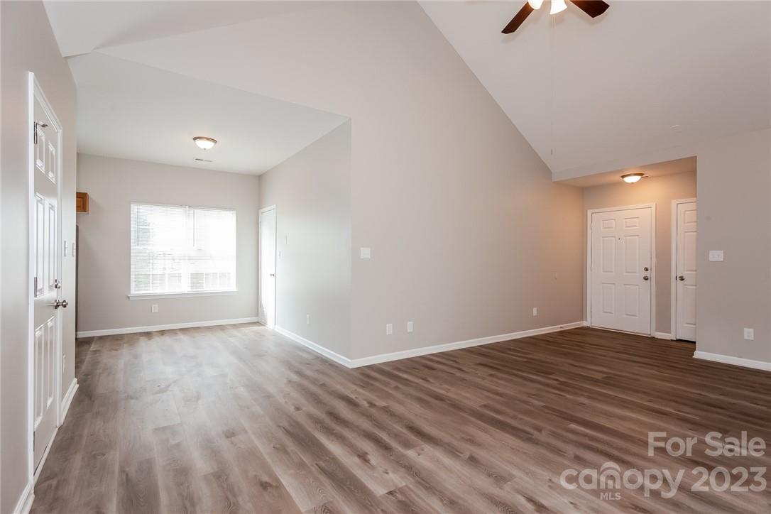 8215 Pozzi Road Charlotte, NC 28216 - Photo 3 of 15 a view of an empty room and window