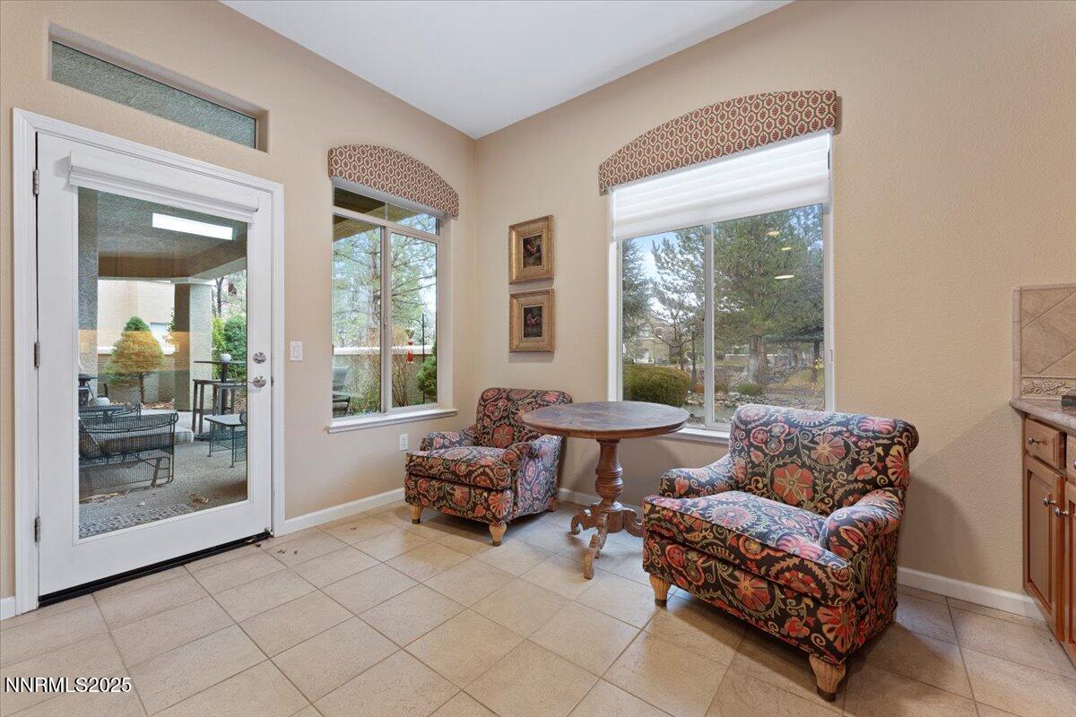 9900 Wilbur May Parkway, Unit 602 Reno, NV 89521 - Photo 15 of 32 a living room with furniture and a large window