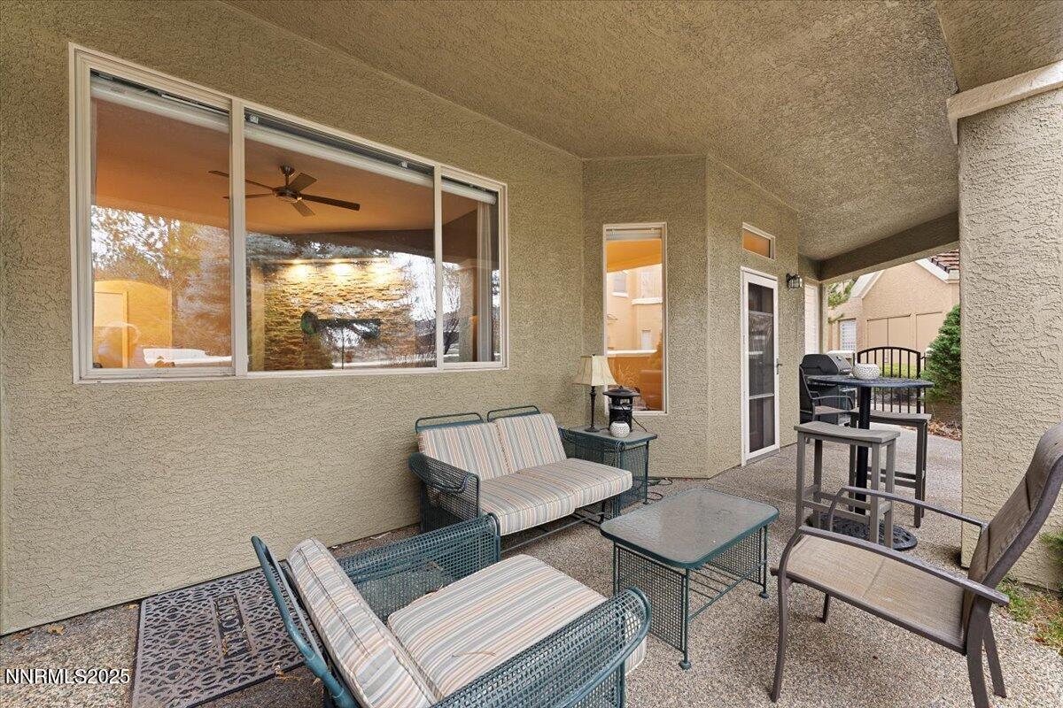 9900 Wilbur May Parkway, Unit 602 Reno, NV 89521 - Photo 17 of 32 a living room with furniture and a window