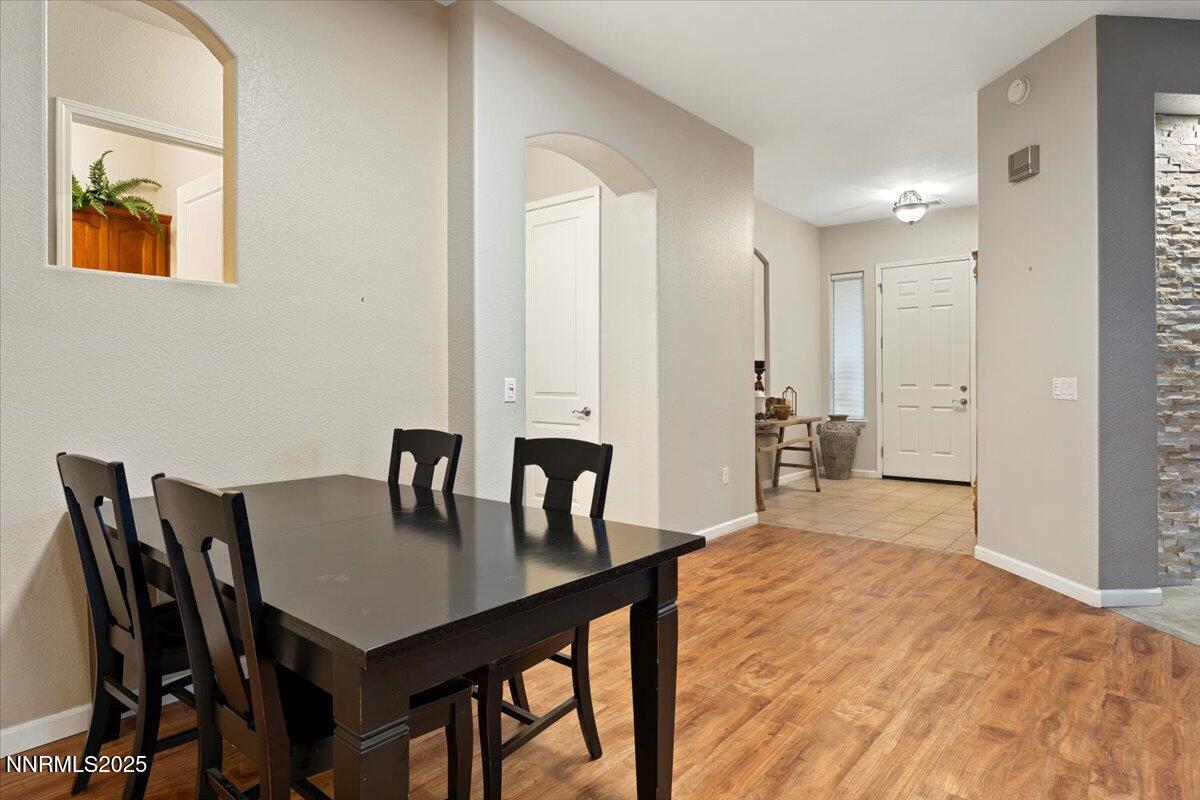 9900 Wilbur May Parkway, Unit 602 Reno, NV 89521 - Photo 18 of 32 a view of a dining room with furniture and window