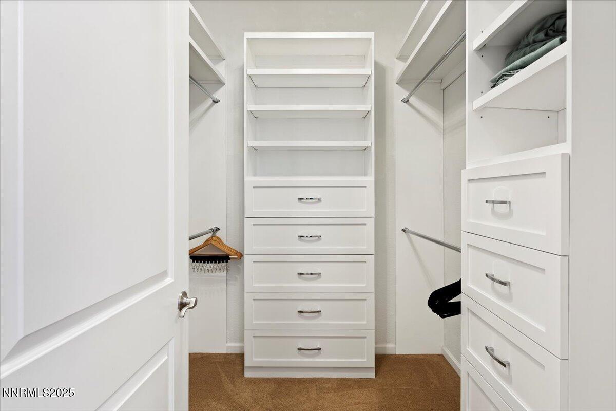 9900 Wilbur May Parkway, Unit 602 Reno, NV 89521 - Photo 24 of 32 a view of walk in closet with clothes