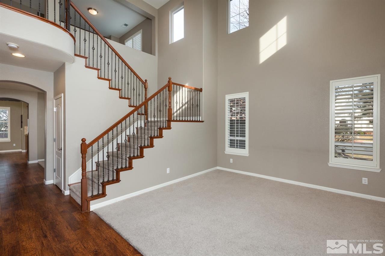 14005 Traveler Court Reno, NV 89521 - Photo 2 of 25 a view of entryway and hall with wooden floor