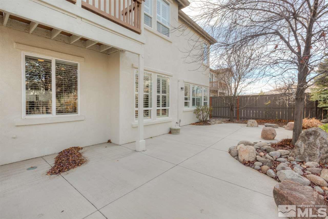 14005 Traveler Court Reno, NV 89521 - Photo 23 of 25 a view of a house with a snow in the yard
