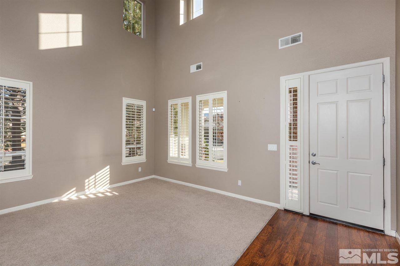 14005 Traveler Court Reno, NV 89521 - Photo 3 of 25 a view of livingroom with furniture wooden floor and window