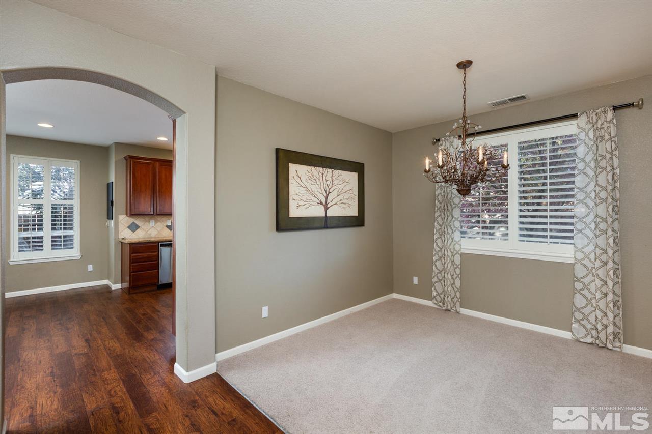 14005 Traveler Court Reno, NV 89521 - Photo 4 of 25 a view of livingroom with furniture wooden floor and window