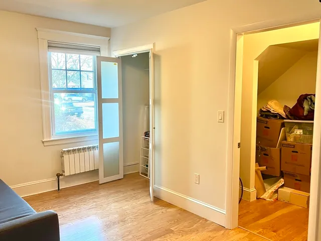 a view of a bedroom with closet area