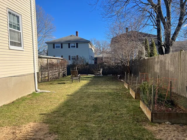a view of swimming pool with an outdoor seating