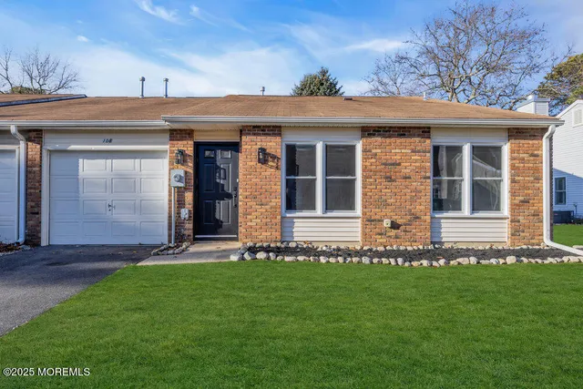 a view of a house with garden