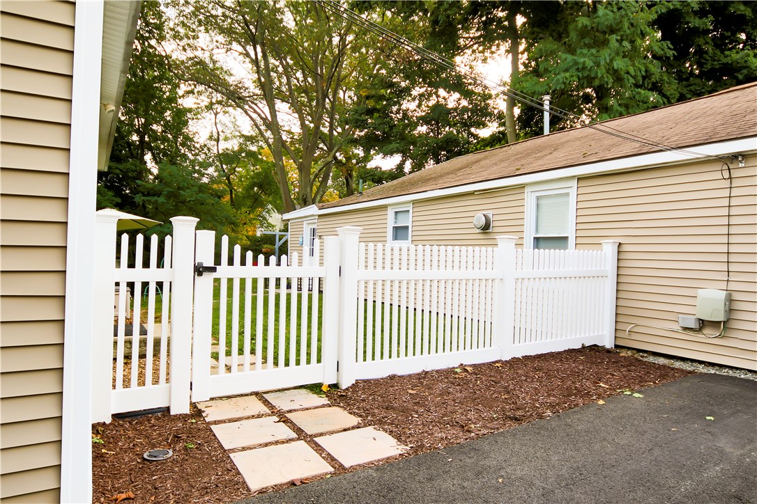 787 Bernon Street Woonsocket, RI 02895 - Photo 28 of 37 Backyard/Rear Unit Entrance