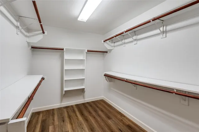 a view of an empty walk in closet