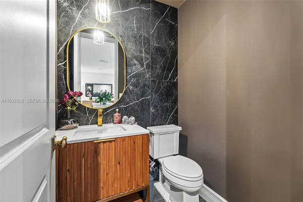 a view of a living room with a flat screen tv