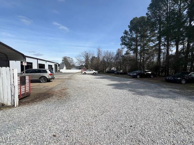 851 Erwin Road Dunn, NC 28334 - Photo 3 of 12 a view of street with parked cars