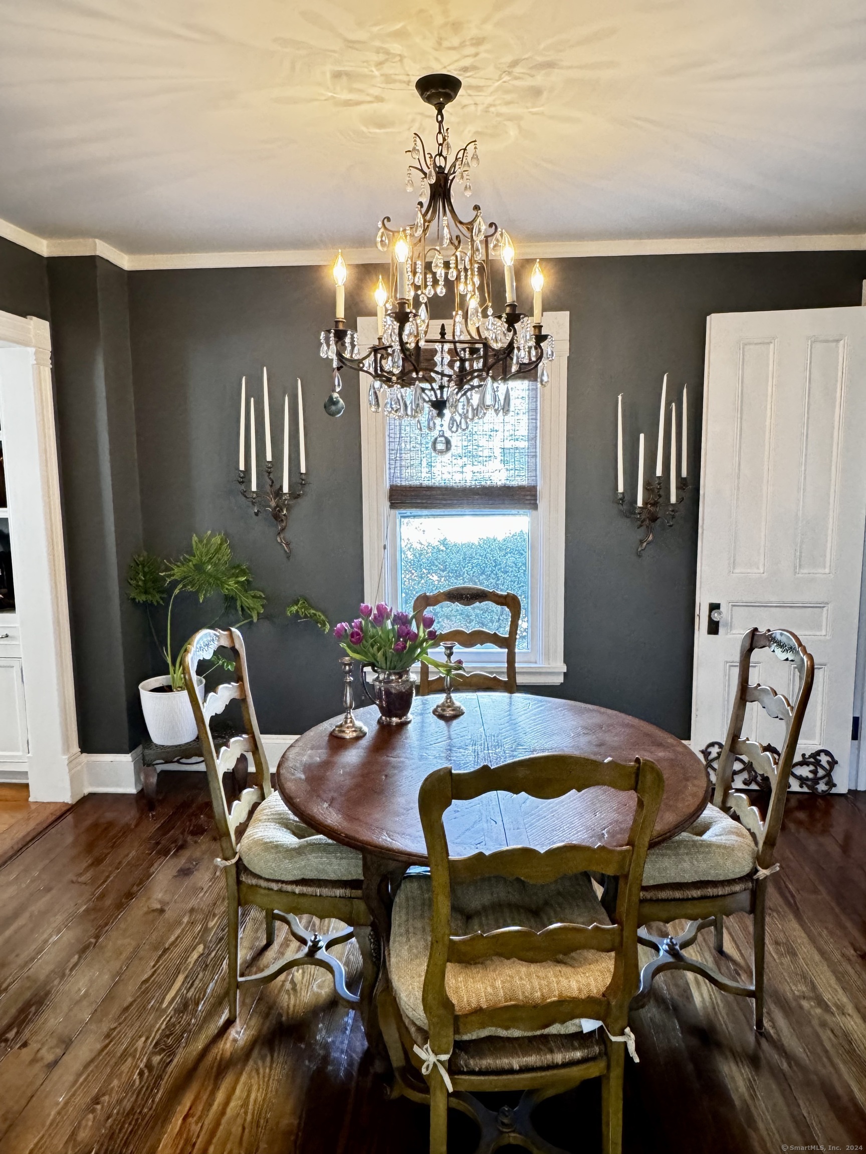 233 Rowayton Avenue Norwalk, CT 06853 - Photo 12 of 33 a view of a dining room with furniture and wooden floor