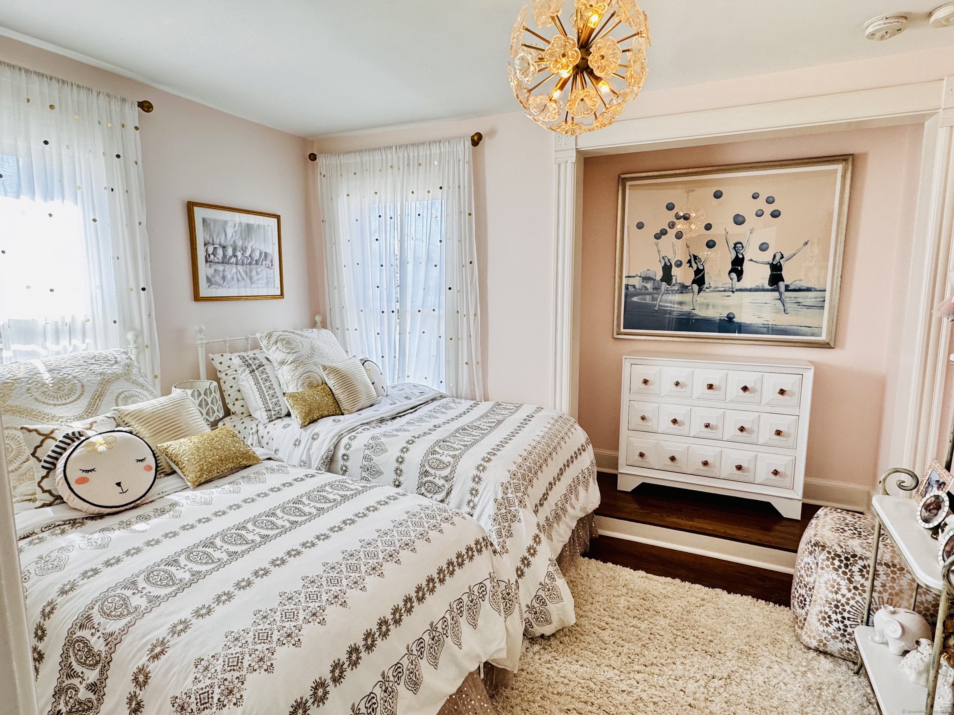 233 Rowayton Avenue Norwalk, CT 06853 - Photo 20 of 33 a bedroom with a bed and a window