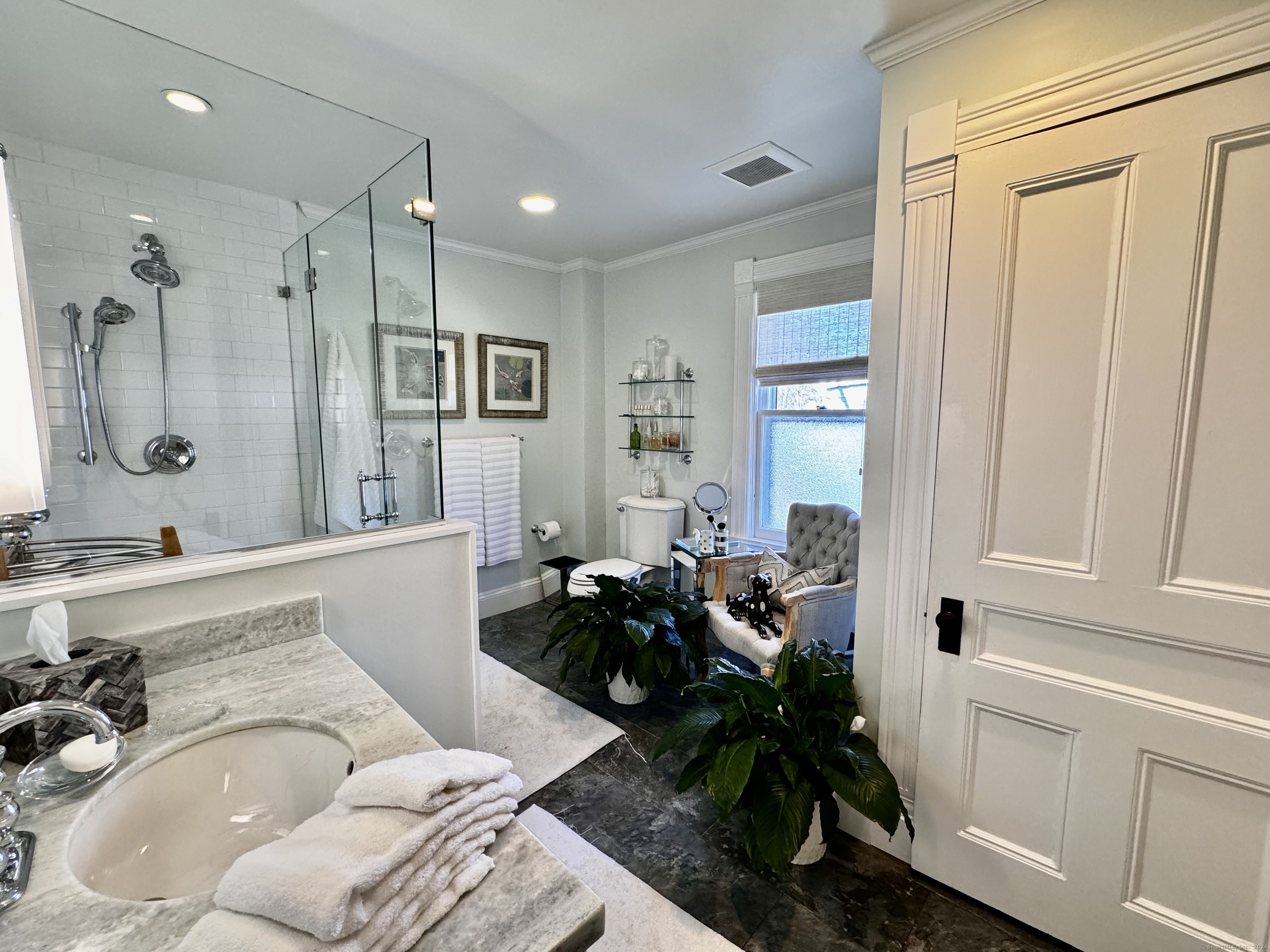 233 Rowayton Avenue Norwalk, CT 06853 - Photo 21 of 33 a living room with furniture and a potted plant
