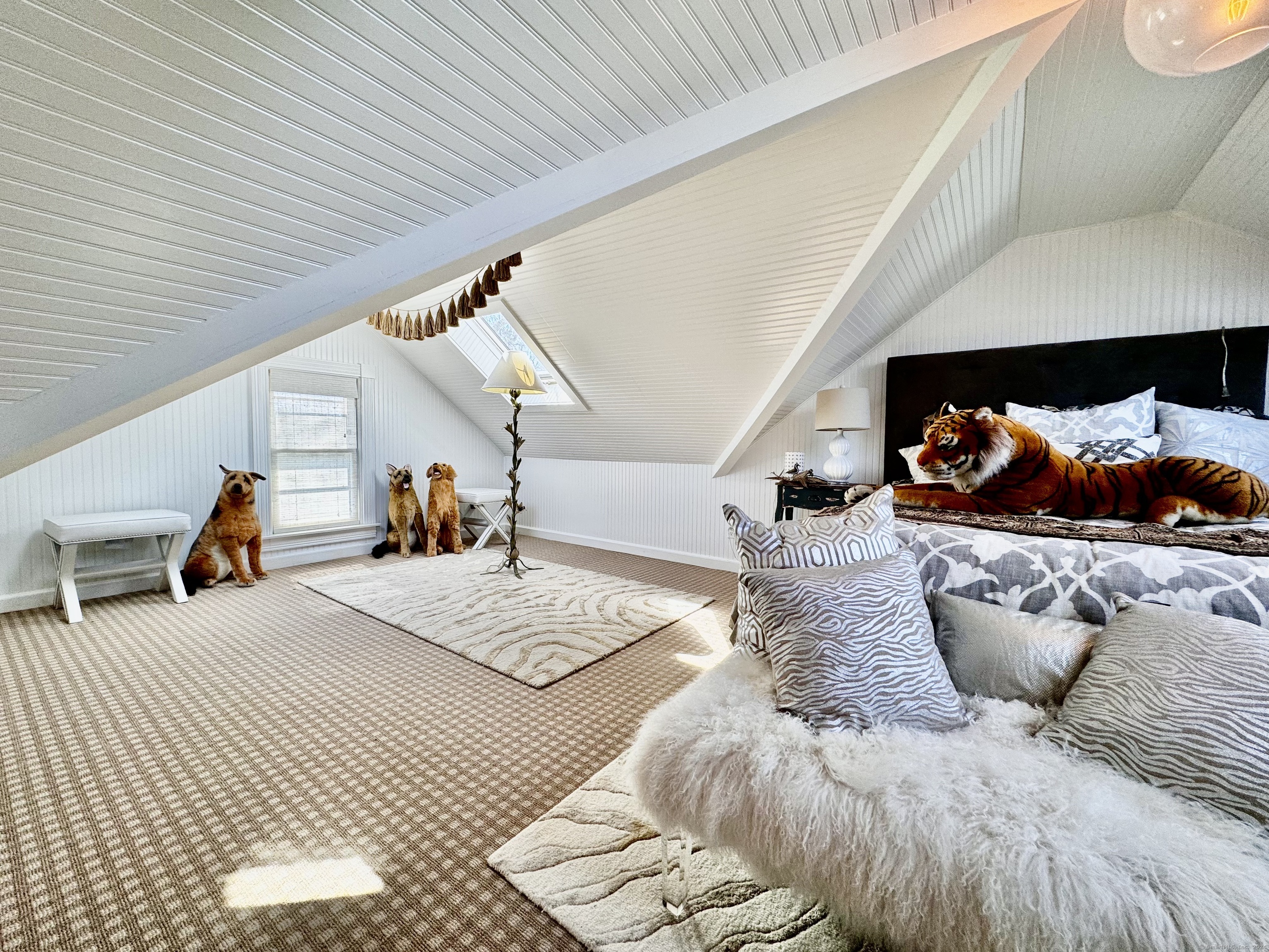 233 Rowayton Avenue Norwalk, CT 06853 - Photo 26 of 33 a bed room with furniture and a wooden floor