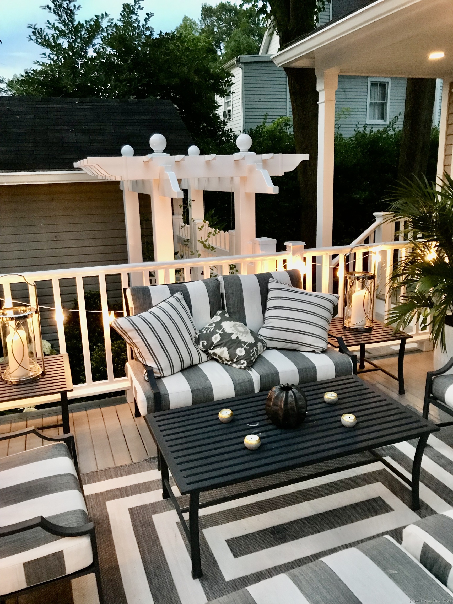 233 Rowayton Avenue Norwalk, CT 06853 - Photo 30 of 33 a view of a patio with couches chairs and wooden floor