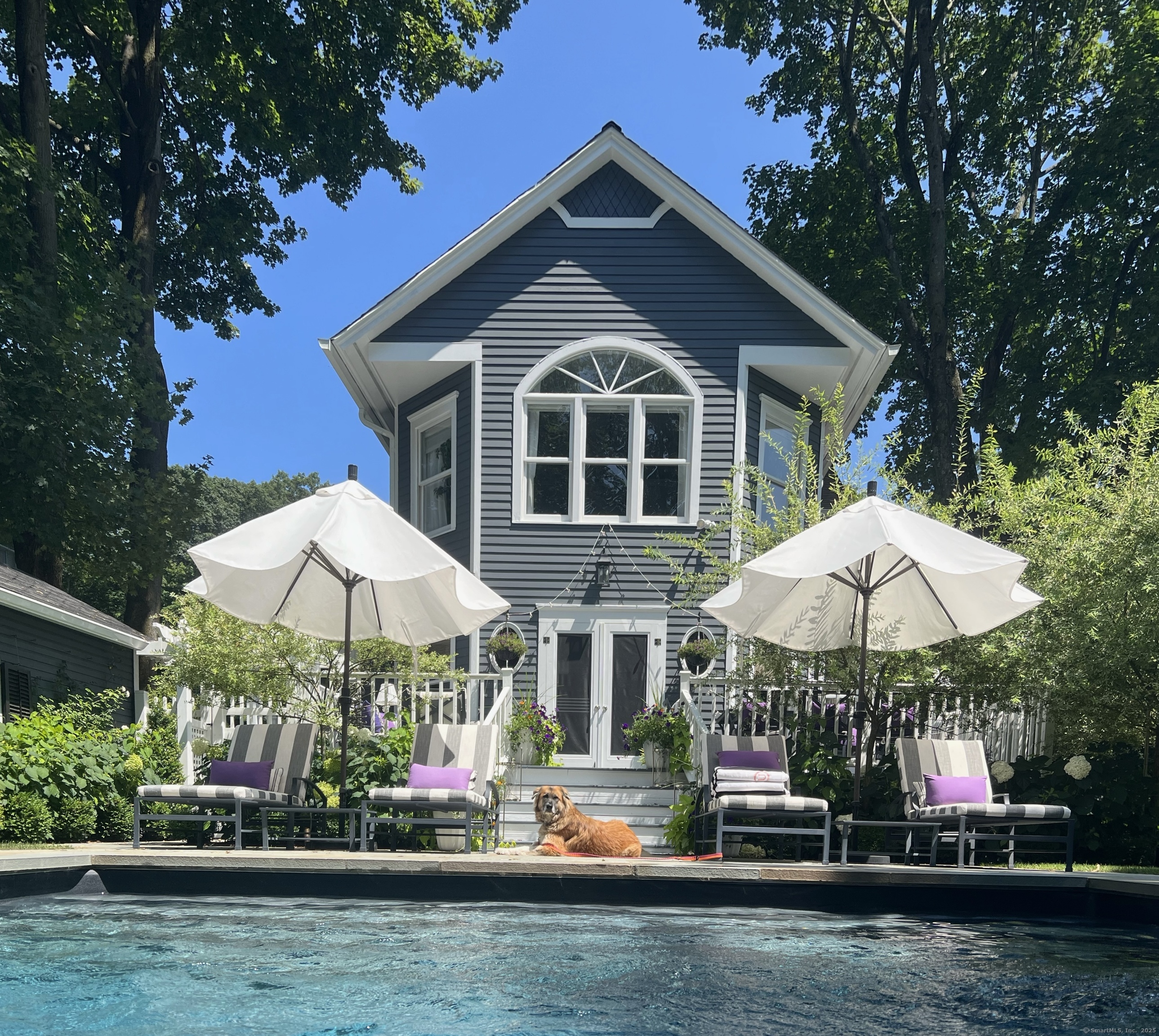 233 Rowayton Avenue Norwalk, CT 06853 - Photo 33 of 33 an outdoor space with patio furniture and white umbrellas