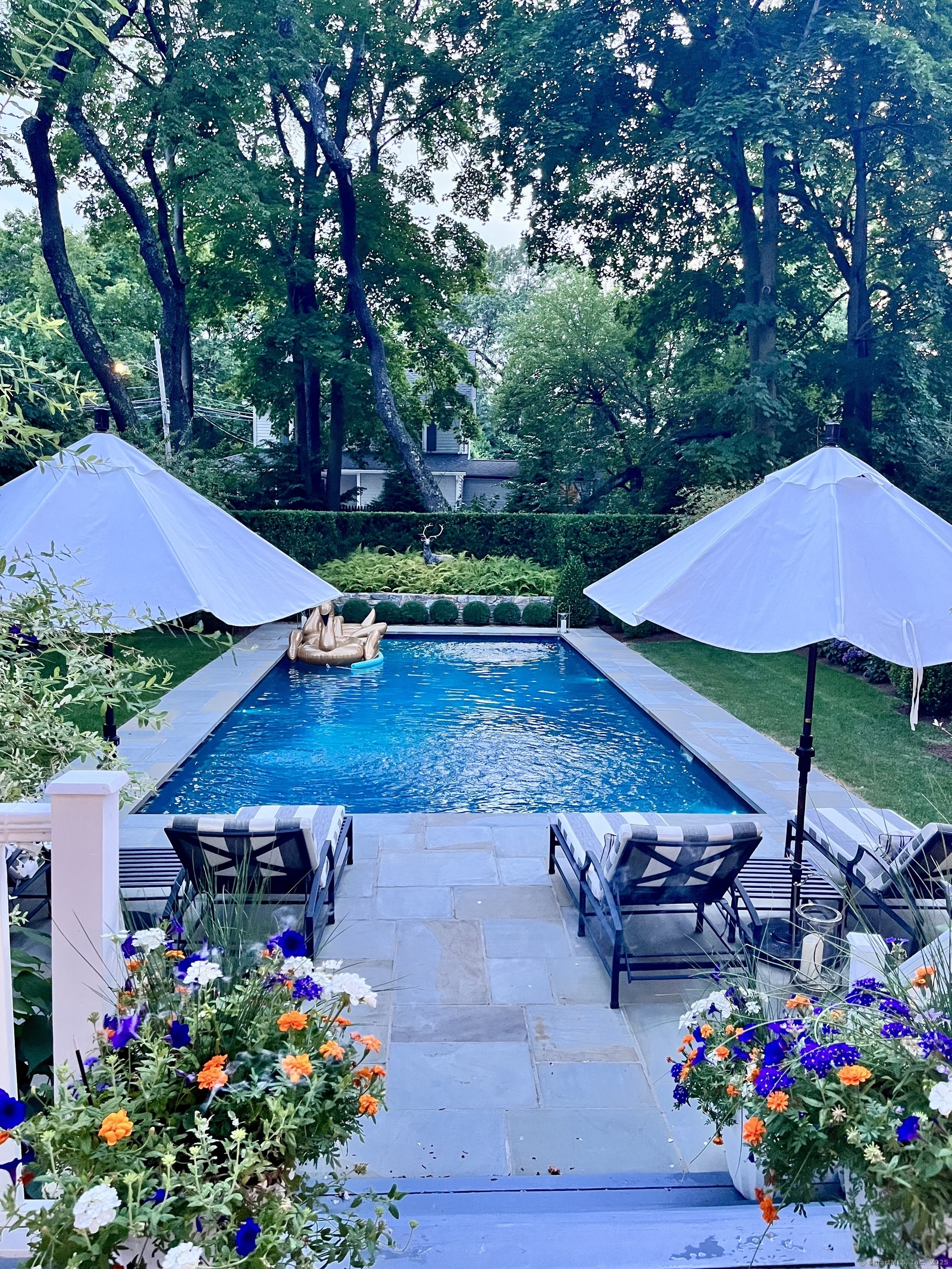 233 Rowayton Avenue Norwalk, CT 06853 - Photo 5 of 33 a view of a backyard with sitting area and furniture