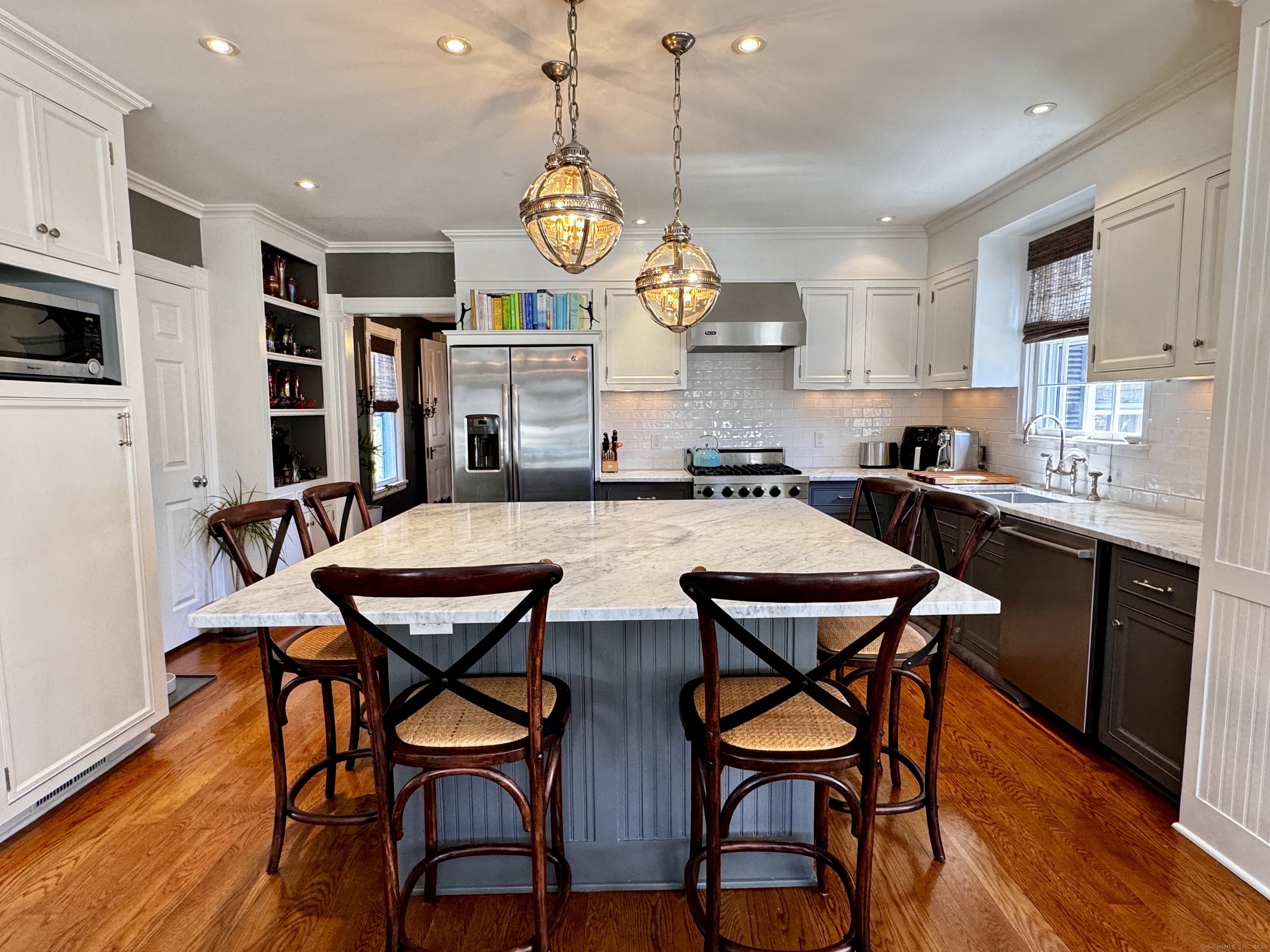 233 Rowayton Avenue Norwalk, CT 06853 - Photo 6 of 33 a view of a dining room with furniture and wooden floor