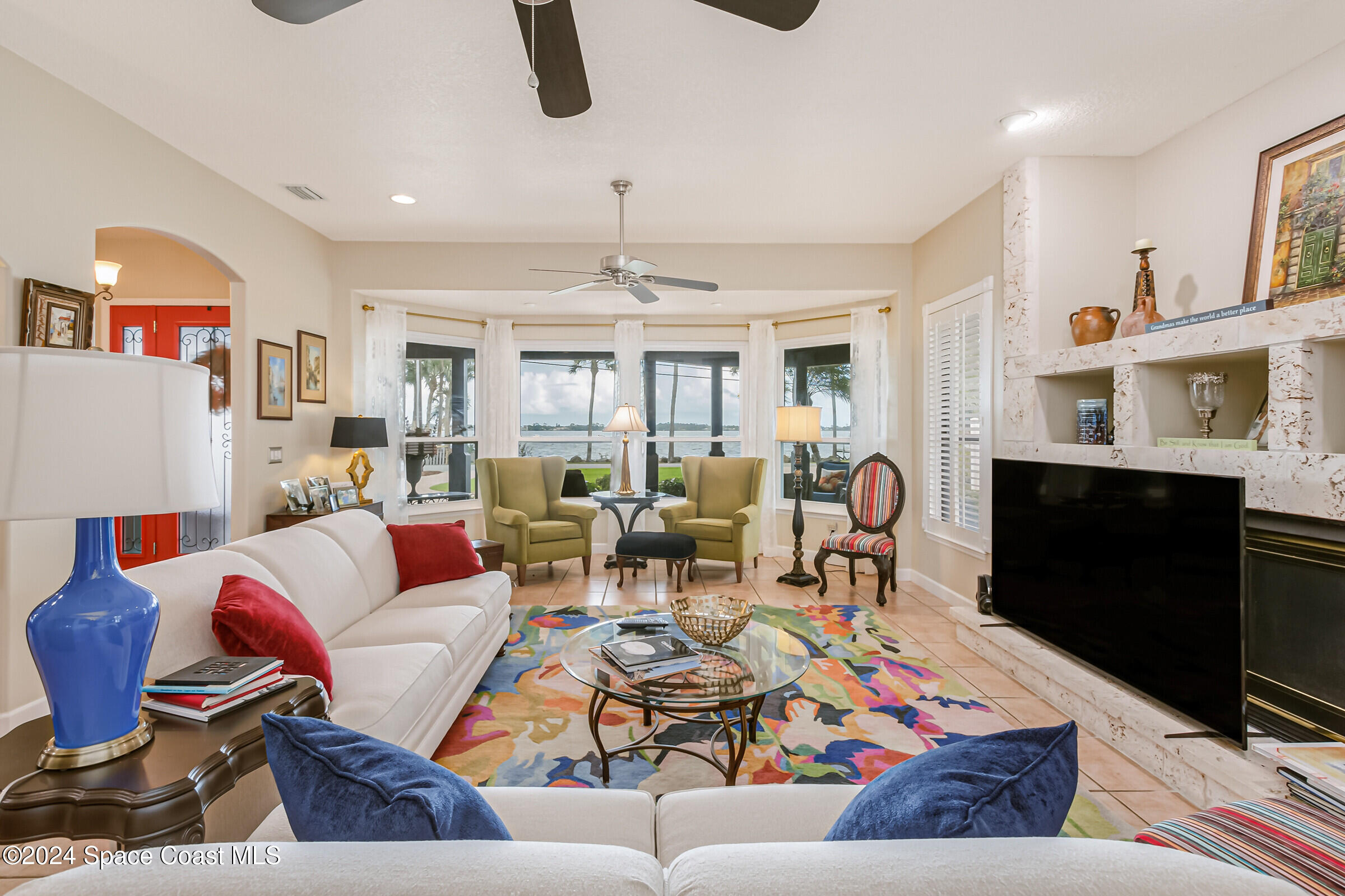 1829 Rockledge Drive Rockledge, FL 32955 - Photo 12 of 53 a living room with furniture fireplace and a window