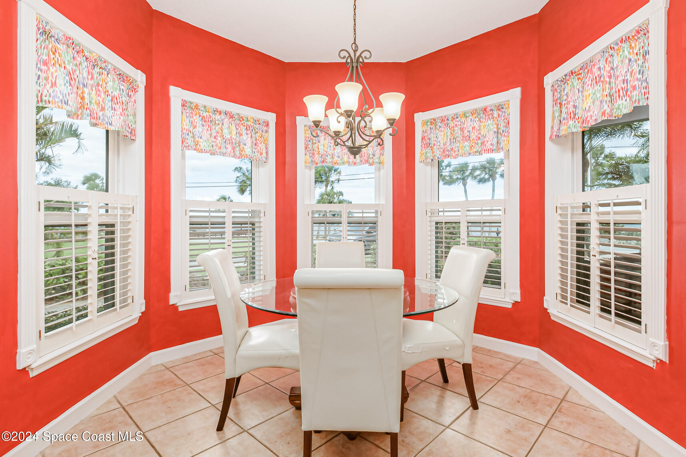 1829 Rockledge Drive Rockledge, FL 32955 - Photo 14 of 53 a living room with furniture and a floor to ceiling window