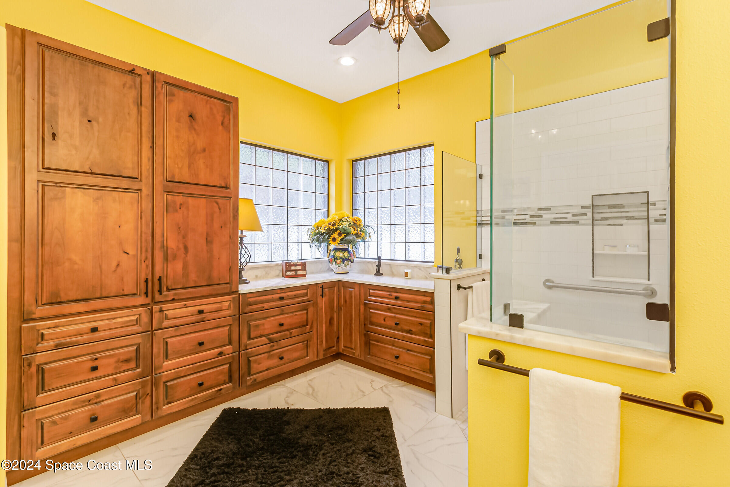 1829 Rockledge Drive Rockledge, FL 32955 - Photo 21 of 53 a bathroom with a tub sink and mirror