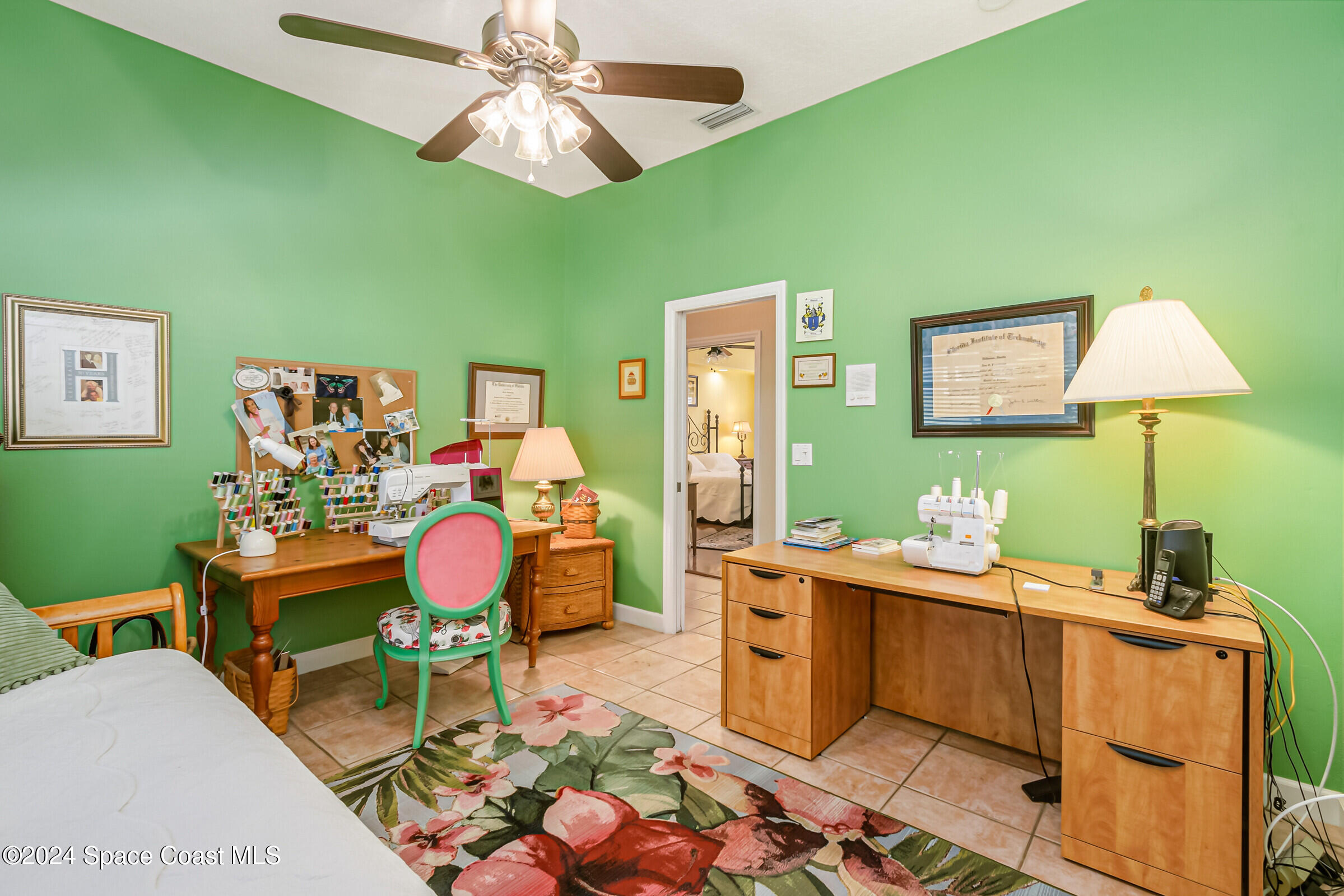 1829 Rockledge Drive Rockledge, FL 32955 - Photo 22 of 53 a room with furniture a fan and a window
