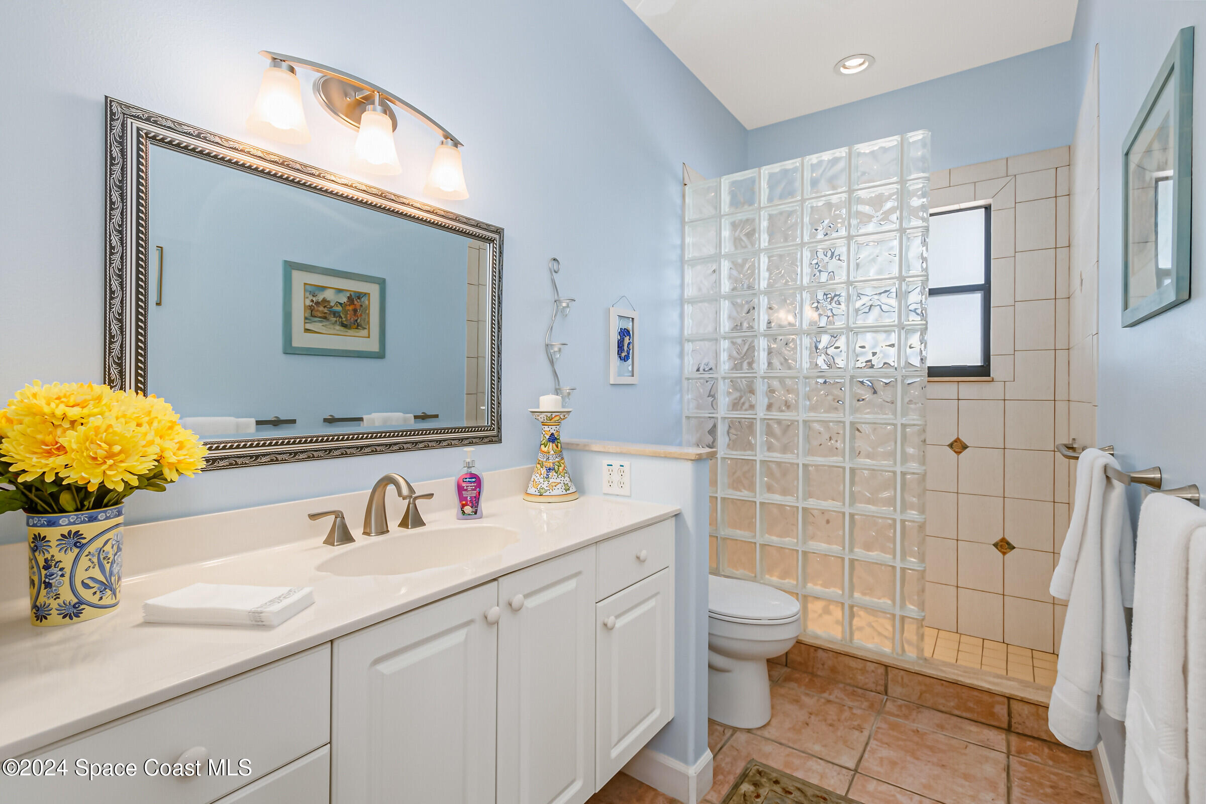 1829 Rockledge Drive Rockledge, FL 32955 - Photo 24 of 53 a bathroom with a sink a toilet and shower