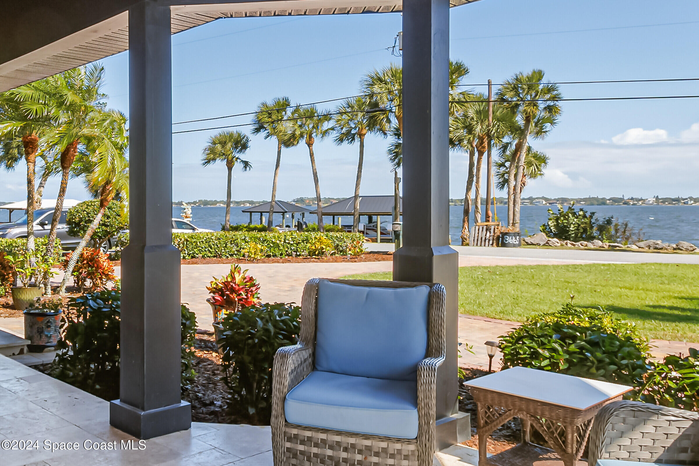 1829 Rockledge Drive Rockledge, FL 32955 - Photo 27 of 53 a view of a swimming pool with a lawn chairs and a yard