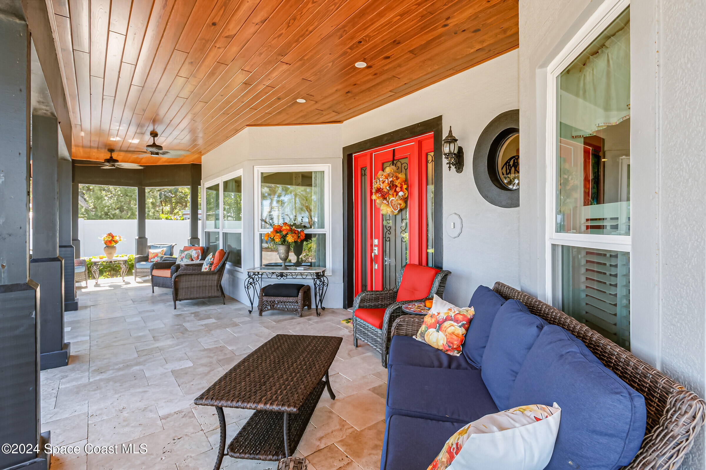 1829 Rockledge Drive Rockledge, FL 32955 - Photo 29 of 53 a living room with furniture a rug and a large window