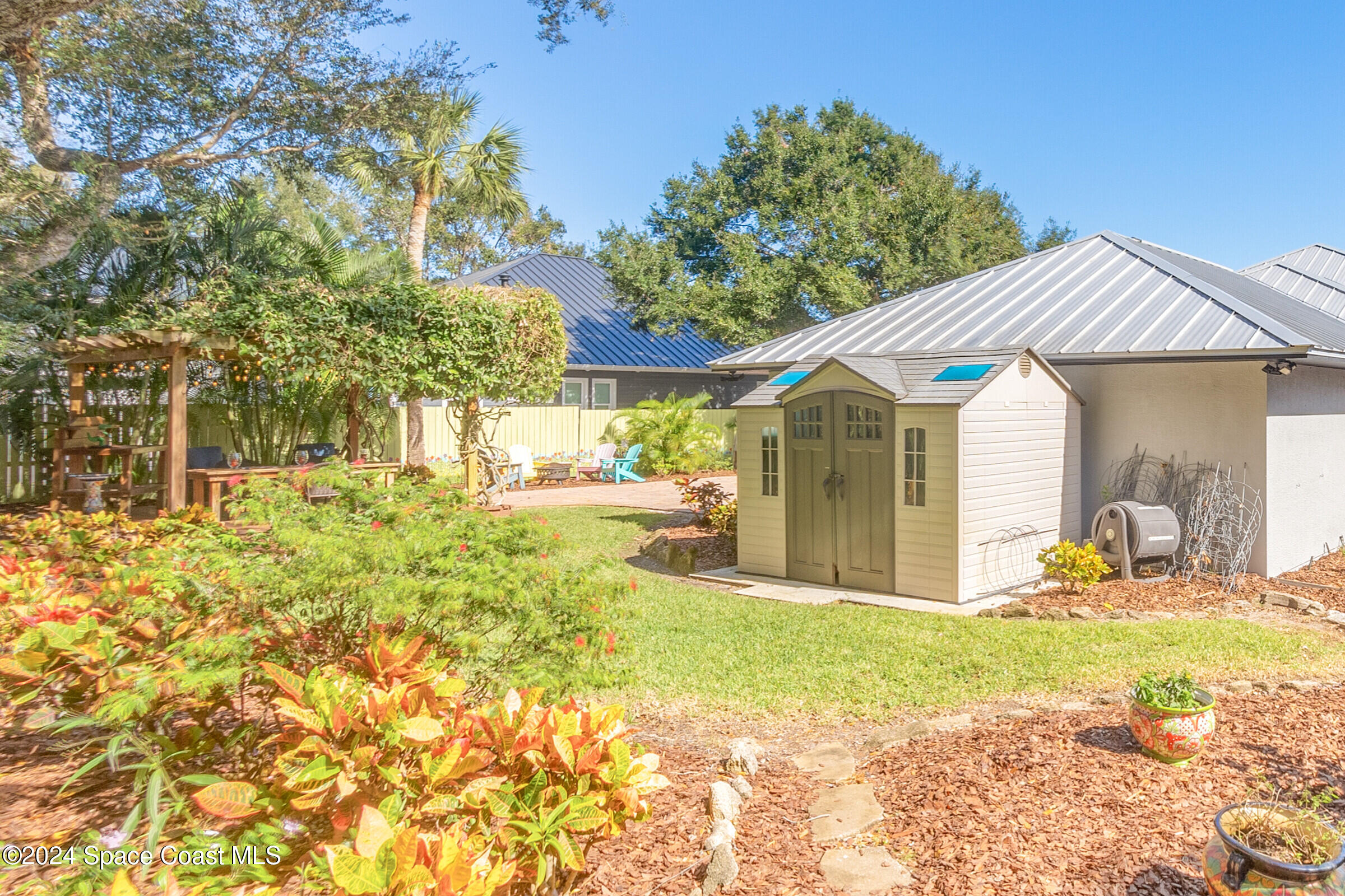 1829 Rockledge Drive Rockledge, FL 32955 - Photo 34 of 53 a view of a house with backyard and sitting area