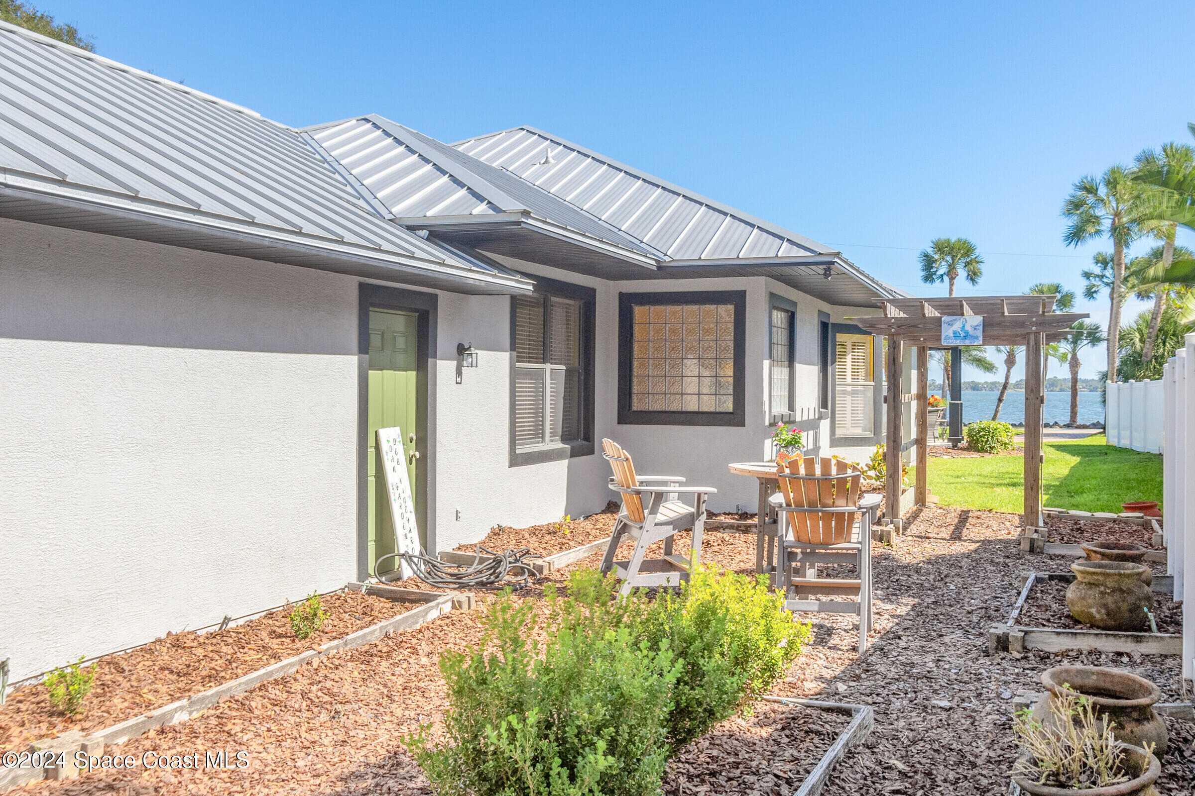 1829 Rockledge Drive Rockledge, FL 32955 - Photo 35 of 53 a front view of house with outdoor seating