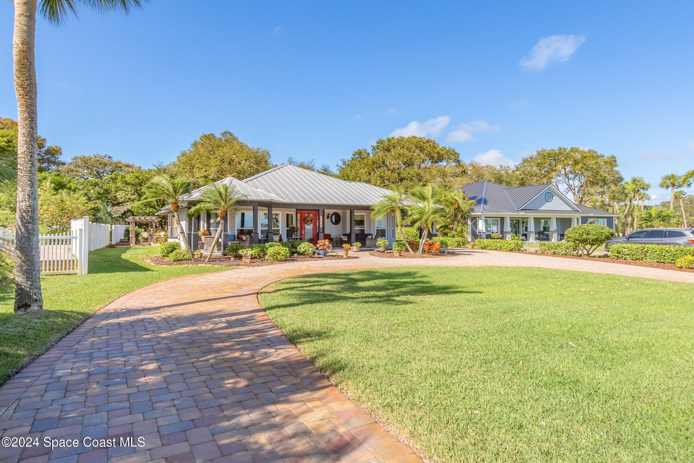 1829 Rockledge Drive Rockledge, FL 32955 - Photo 4 of 53 a view of swimming pool with lawn chairs and large trees