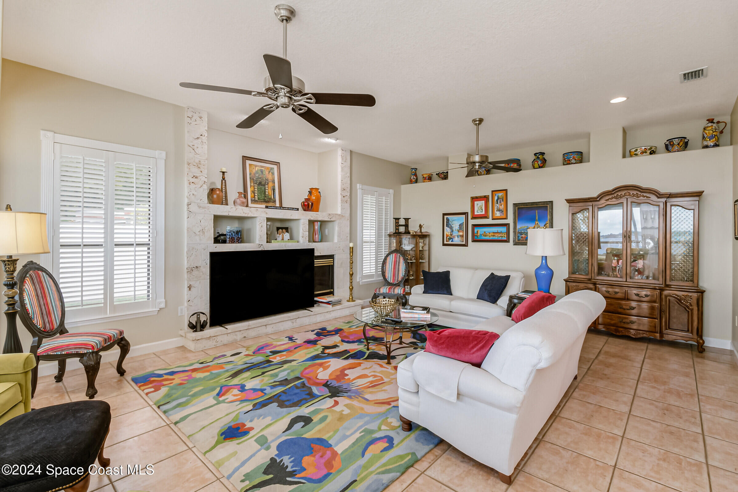 1829 Rockledge Drive Rockledge, FL 32955 - Photo 10 of 53 a living room with furniture and flat screen tv