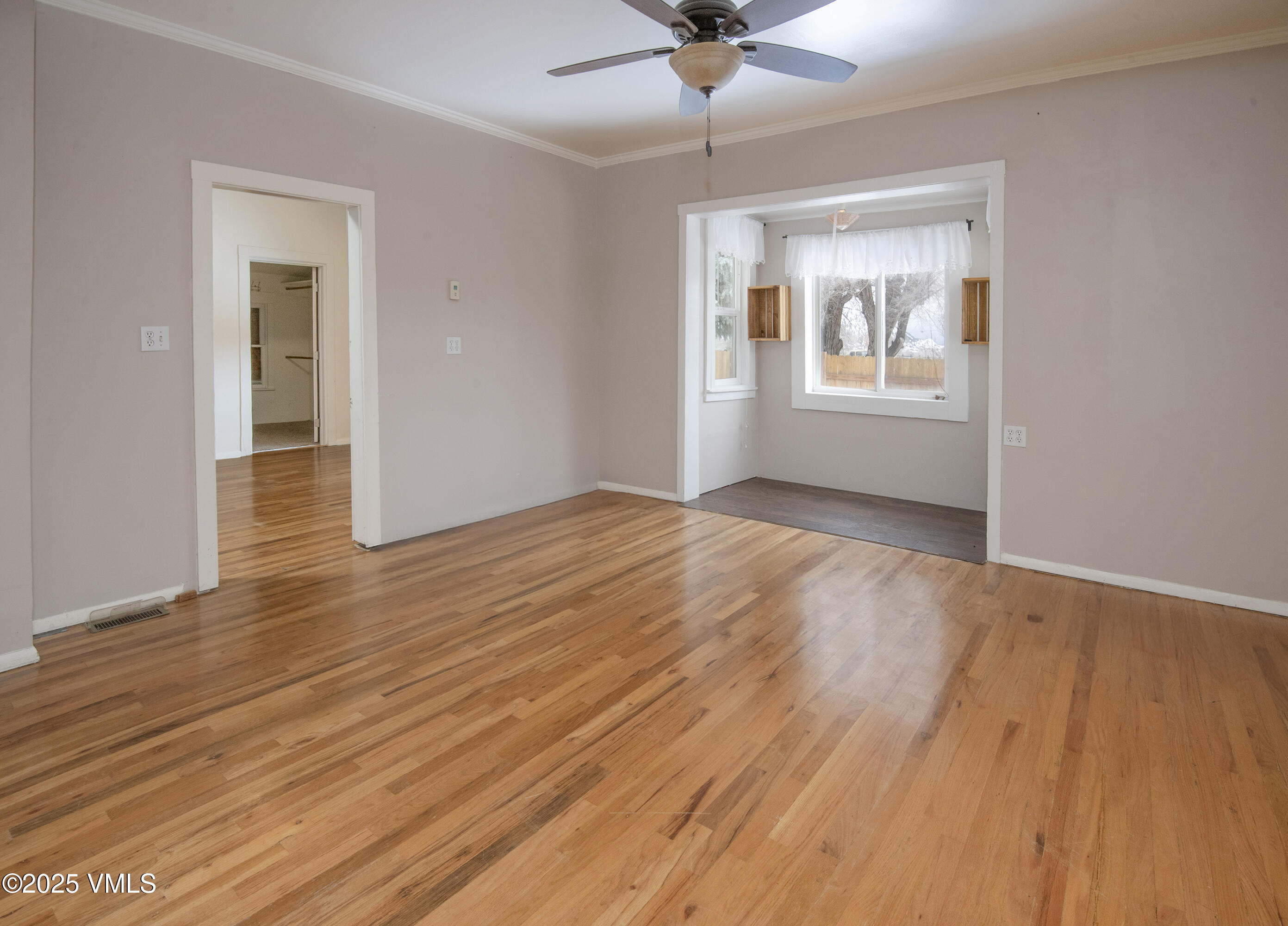 432 West 5th Street Eagle, CO 81631 - Photo 12 of 27 wooden floor in an empty room with a window