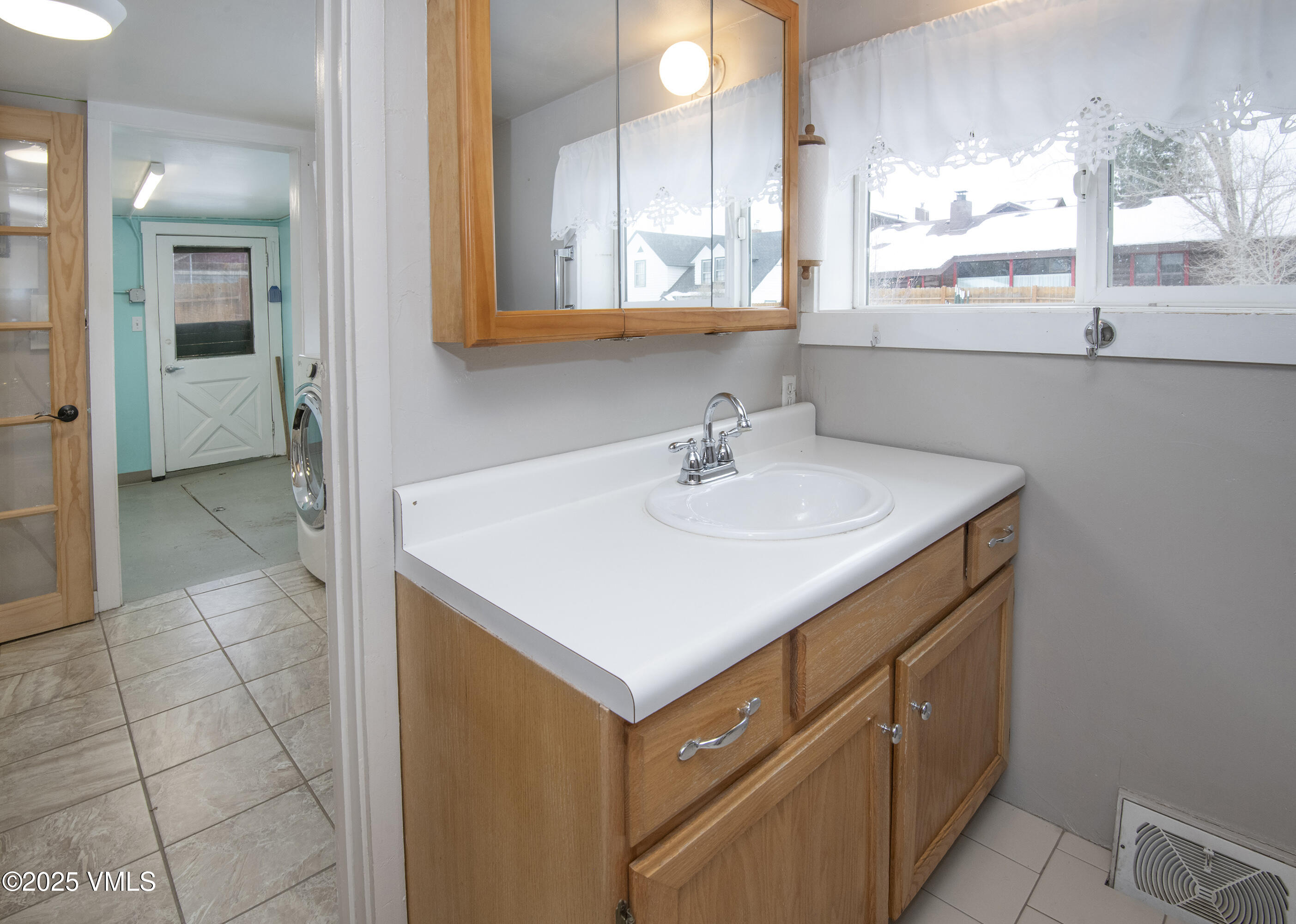 432 West 5th Street Eagle, CO 81631 - Photo 14 of 27 a bathroom with a sink and a mirror