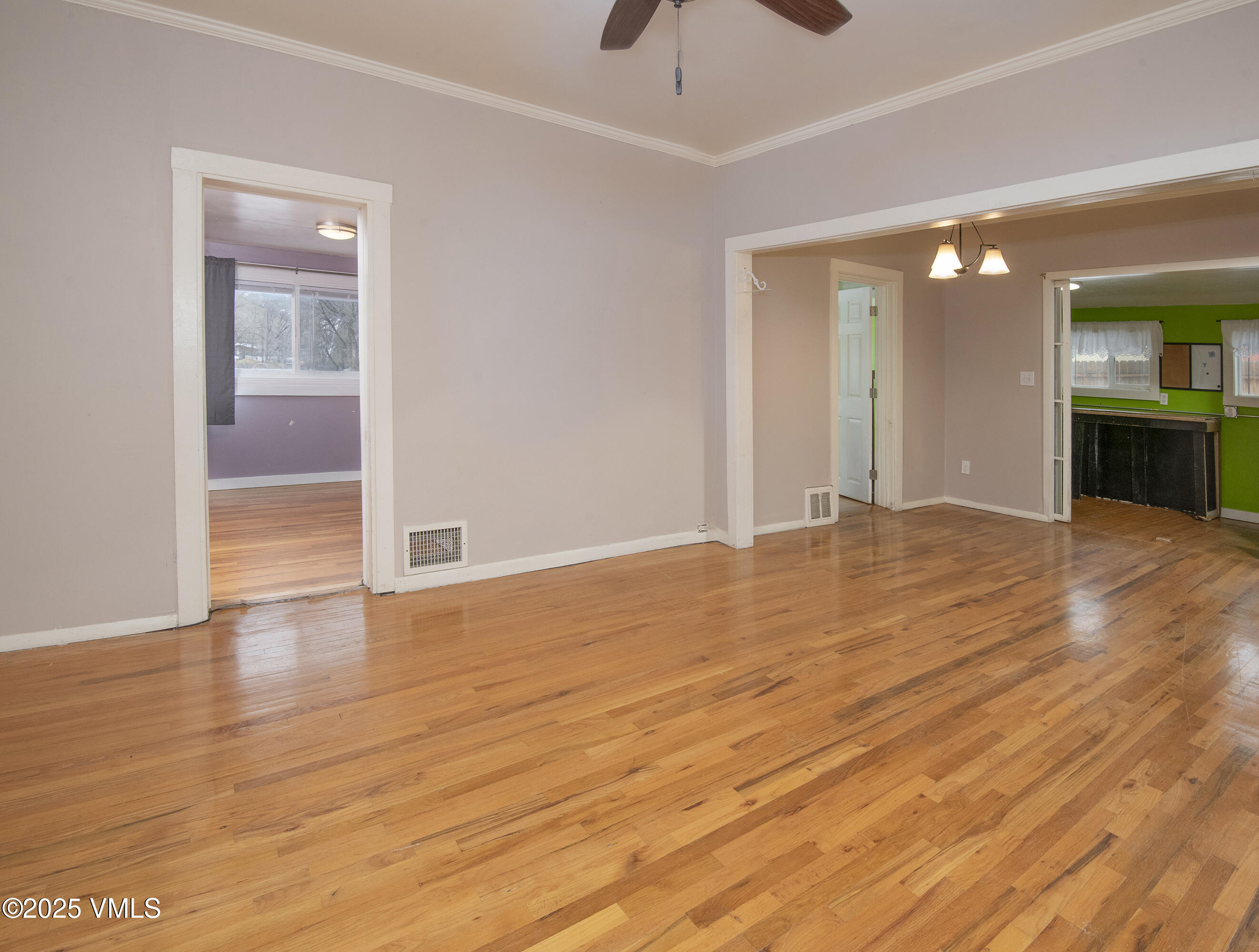 432 West 5th Street Eagle, CO 81631 - Photo 15 of 27 a view of an empty room with wooden floor and a cabinet