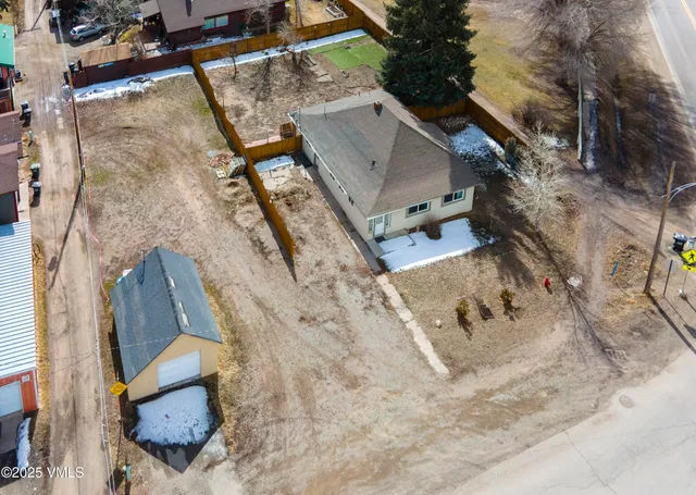 a view of a backyard and a yard