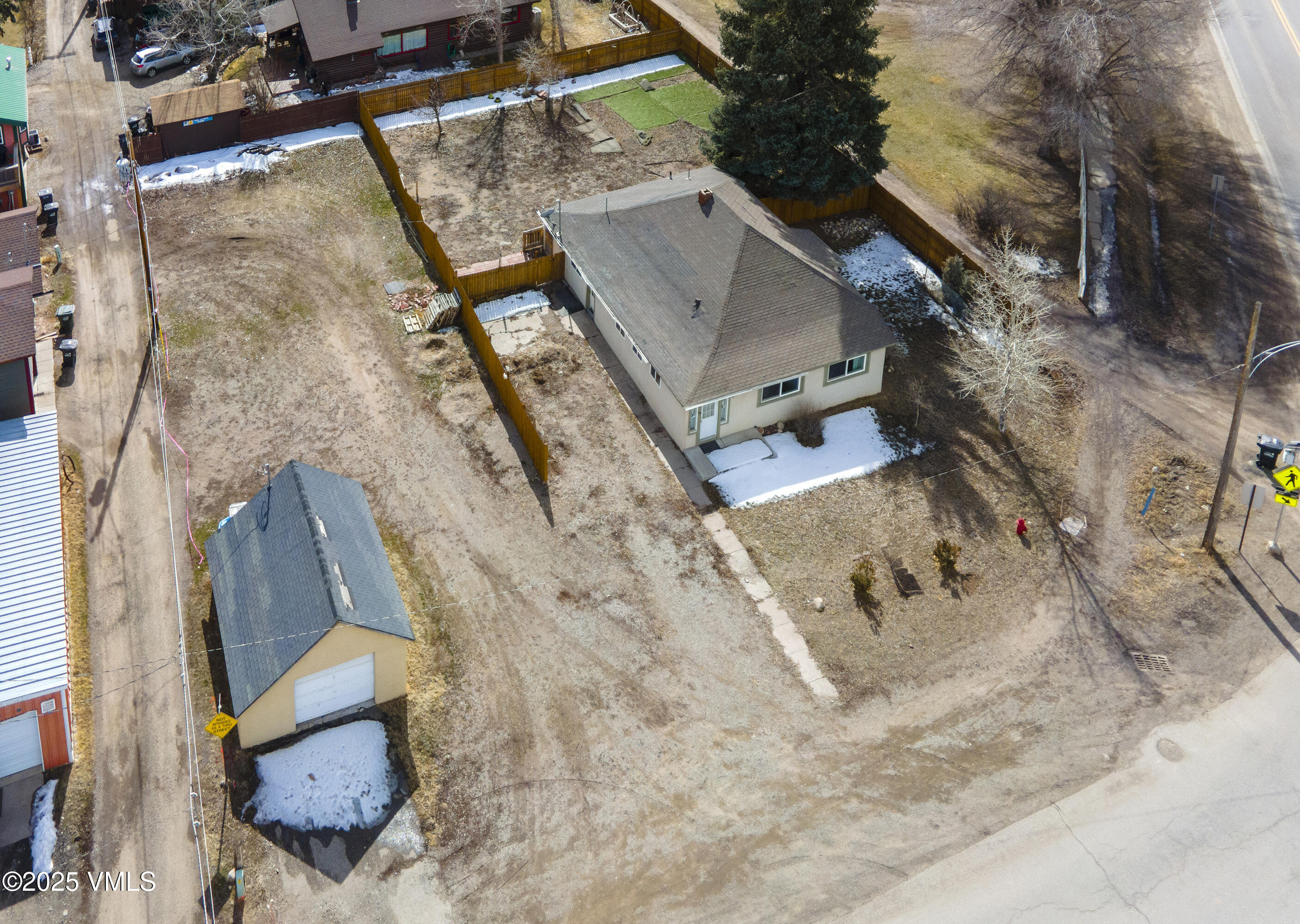 432 West 5th Street Eagle, CO 81631 - Photo 21 of 27 a view of a house with a backyard