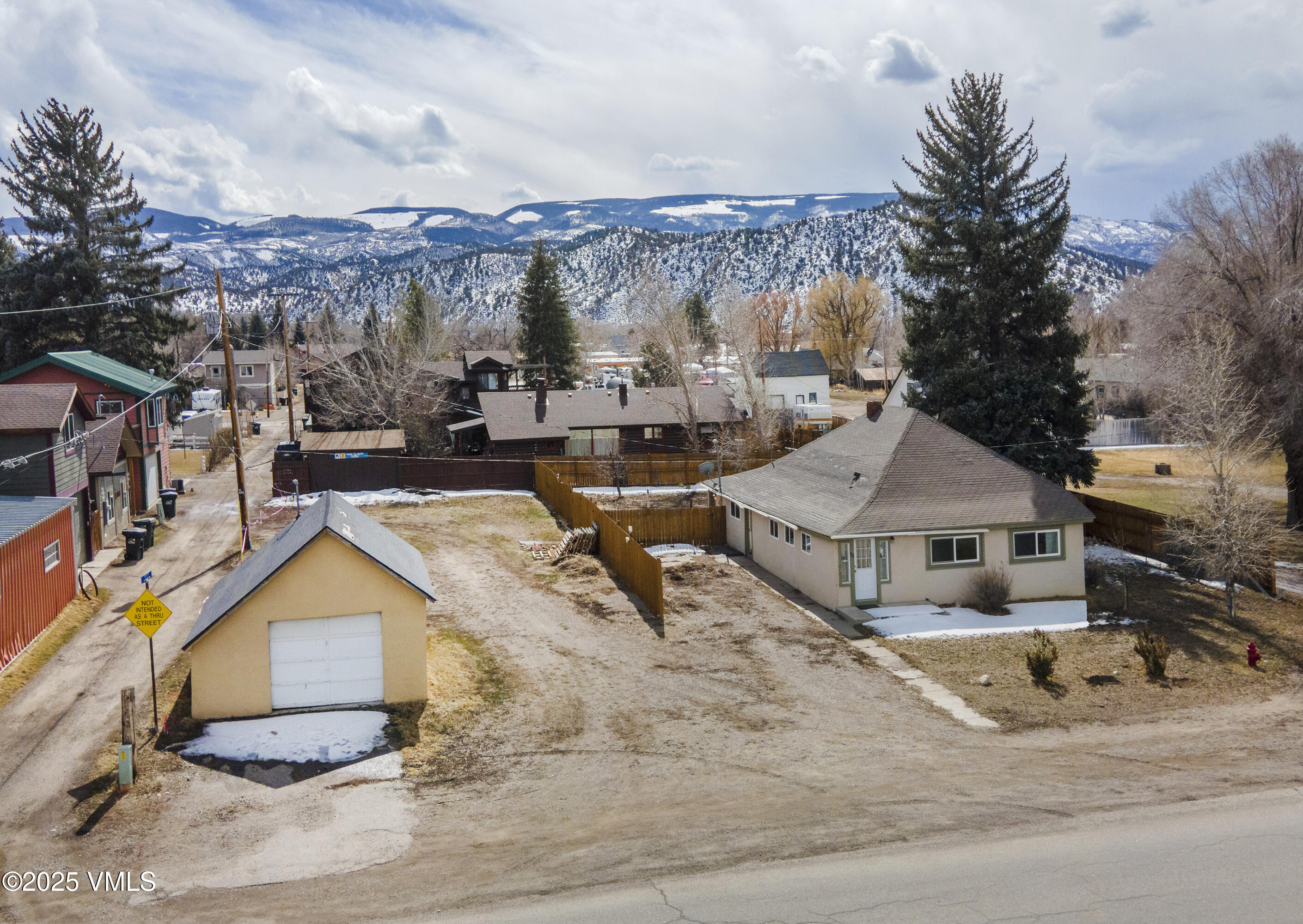 432 West 5th Street Eagle, CO 81631 - Photo 25 of 27 a view of a house with swimming pool and sitting area