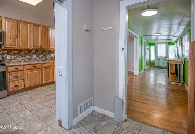 a view of a bathroom with a glass door