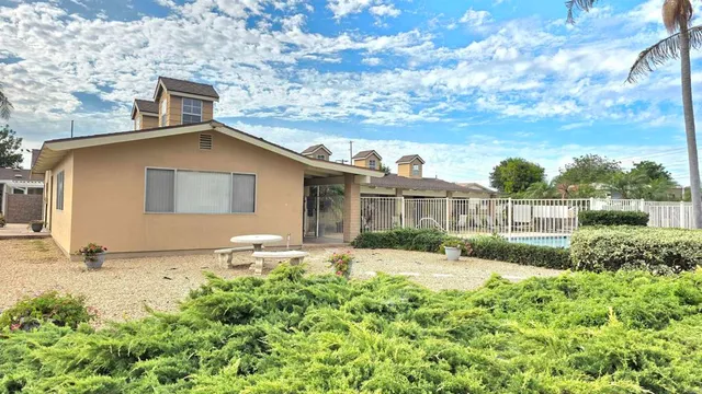 a front view of a house with a garage