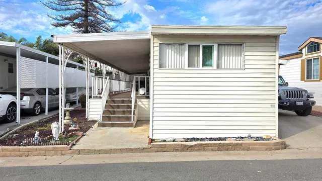 a view of a house with a street
